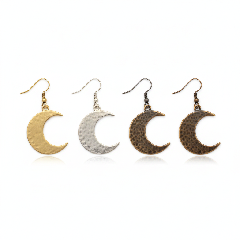 AI Etsy listing image generator result: a variation lineup on pure white showing four single earrings in a row, one polished brass, one brushed silver and two in near identical antiqued bronze. The render quality is genuinely good. The white is flat and even, all four hang at the same height, the lighting is identical across the row, each has its own soft contact shadow, the three finishes are clearly and correctly distinct as metals, and there is no text, no swatch label and no dividing line anywhere. The arithmetic is entirely wrong. Three pairs were asked for, which is six earrings arranged as three tidy couples, and four unpaired singles arrived, two of which are the same bronze finish rendered twice. This is the most reliable failure in the whole series: this model counts fixed fittings well and merchandise badly, so any frame whose job is to show how many things you get needs counting by eye before it goes anywhere near a listing.