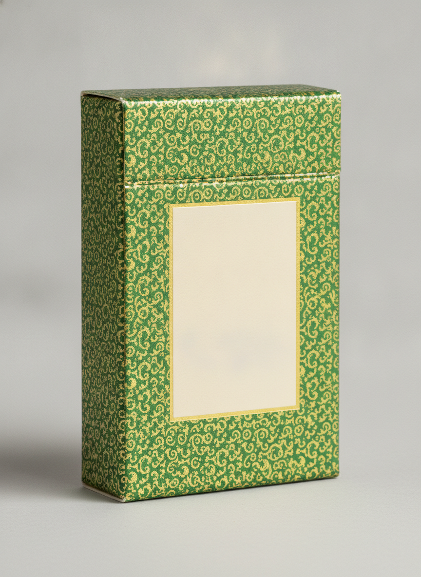 A tuck box wrapped in a dense forest green and gold scrollwork repeat, with a gold-keylined cream panel left completely empty in the centre of the front face for a deck name to be typeset later